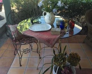 Elegant round outdoor table, set of new William Sonoma placemats, vintage gilt decorated tumblers, granite box, Italian ceramic asparagus plate