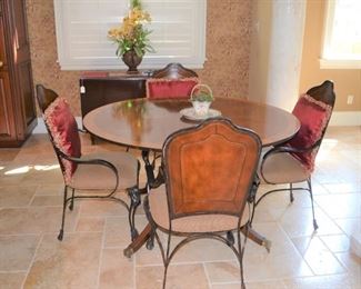 4 IRON CHAIRS AND RED DECORATIVE PILLOWS, ROUND INLAID BANDED TABLE