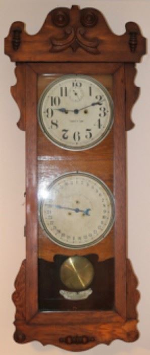Calendar clock by Waterbury Clock Co.