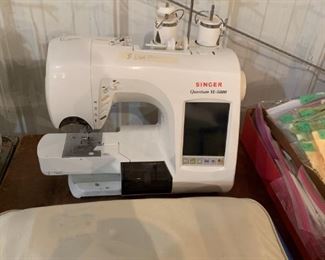 Singer embroidery machine with attachments