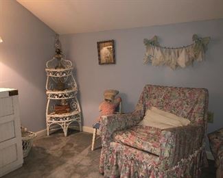 Wicker shelf and dresser to match single beds. Beautiful older chair with slip cover. 