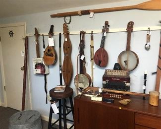 Lots of Musical Instruments: Very old Accordion,      Wash Board Musical Instrument. Lots of Banjo's, Mandolin. Music Books. Guitar String. Music Instrument Straps.