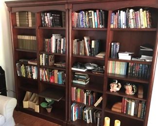 Two lighting bookshelves 7 feet tall and all books within   