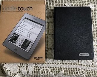 Two Kindle Touches one unused   