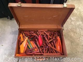 An old suitcase full of Lincoln logs