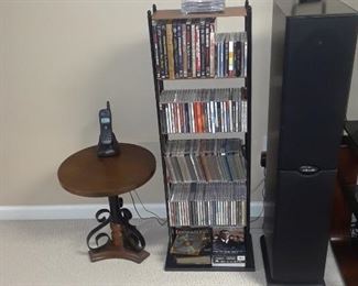 Good selwction of CD's, DVDs; occasional table with wrought iron accents