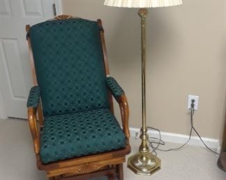 Upholstered rocking chair; floor lamp