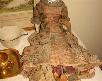 Antique China doll with cloth body and original costume 