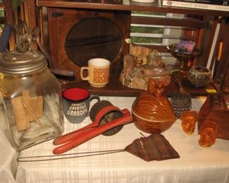 Vintage kitchenware, paddle butter churn, potato ricer, fly swatter, nut bowl