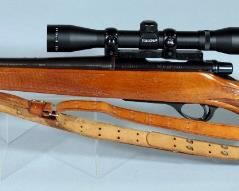 Remington Mohawk 600 .243 WIN Bolt Action Rifle SN# A6354164, With Simmons 4x32 8 pt Scope, Leather Sling And Gun Sock