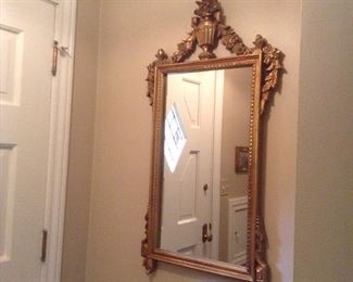 Gold mirror 41H x 21w.