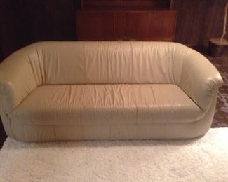 Beige leather sofa. Excellent condition.