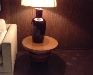 Mid century barrel end table and 70s table lamp.