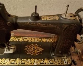 Sewing machine with cabinet