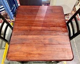 Stained Red and Black Wood Table with Two Chairs https://ctbids.com/#!/description/share/257261