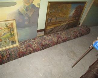 Nice room size oriental rug, and yes... more art