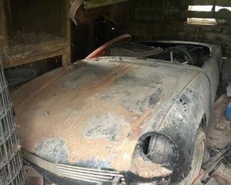 1968 Triumph Spitfire. All of the parts for reassembly are stored inside the home. reassembly required.