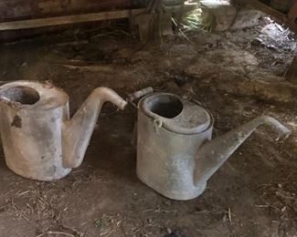 Old watering cans