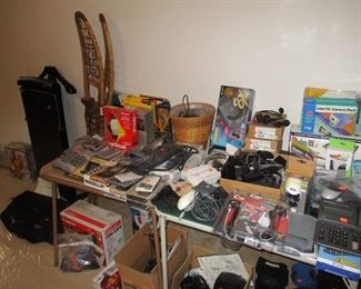 Snow shoes hiding behind a mountain of merch. Christmas is coming.