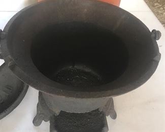 large iron pot with #10 lid . Cooking with coals