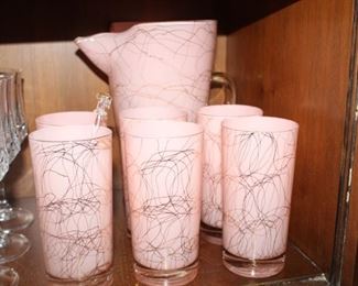 1950's pink glass tumblers with cocktail pitcher.  22K scroll details. 