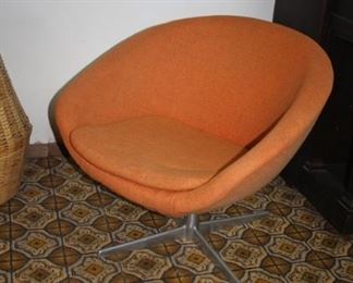 Orange wool fabric designer casual chair.  Narrow metal feet. 