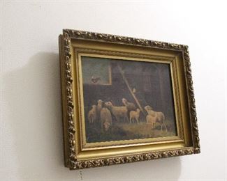 Gold framed painting with lambs