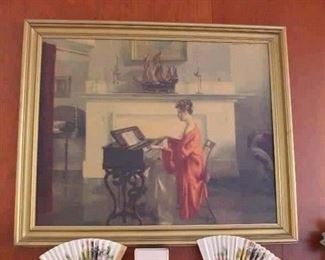 Gold framed lady playing the piano