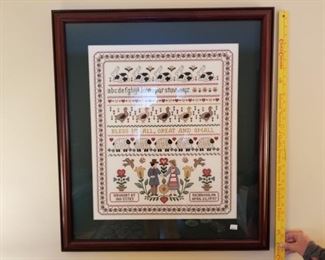 Grandma made many cross-stitch projects and had them professionally framed. 