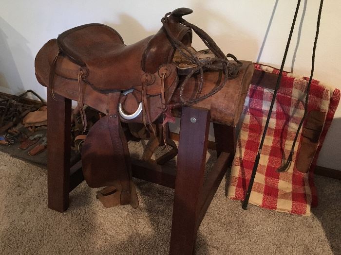 Great vintage saddle on handmade saddle tree.  Lots of accessories too: spurs, whips, more.