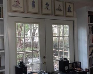Marble top console table; framed Chinese prints above French doors