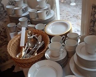 White porcelain dinnerware sets, gold rim set and platinum rim set; silverplated serving flatware