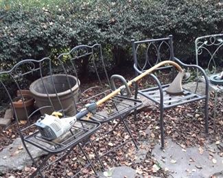 Wrought iron patio chairs; weed eater