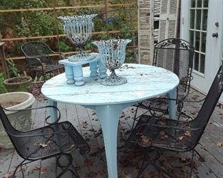 Patio table and wrought iron rockers