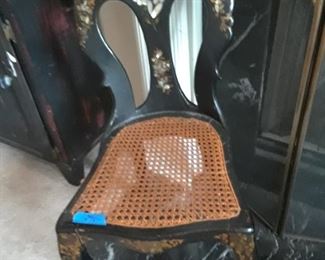 Ebonized chair with abalone and mother of pearl inlay, cane seat