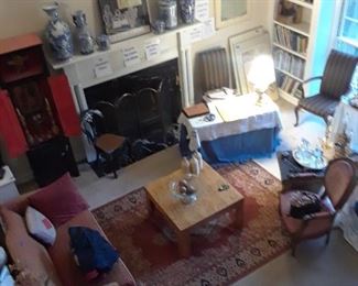 Bird's eye view of living room furniture, accessories, and books