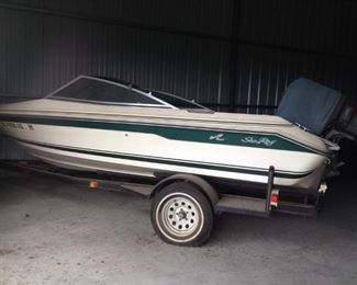 VINTAGE SEA RAY 100 HSP OUTBOARD MOTOR AND OPEN BOW FIBERGLASS BOAT WITH TRAILER.....$1800 or BEST OFFER......SHOWN BY APPOINTMENT ONLY.