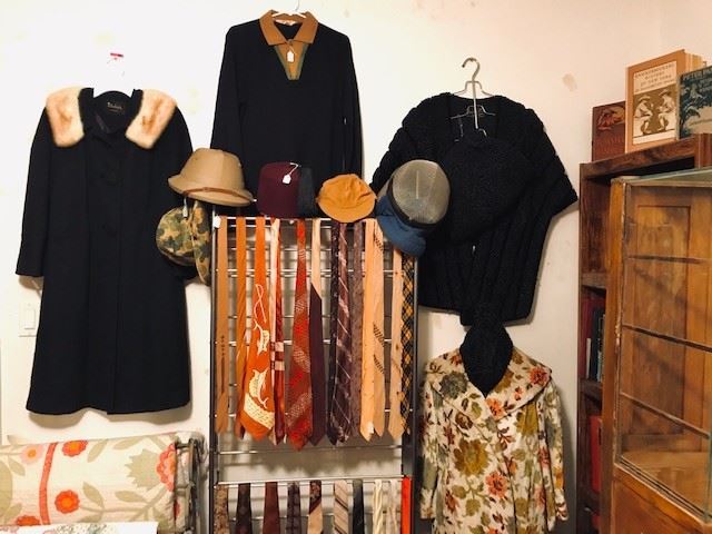 L-R: Vintage wool ladies coat with fur collar, men's Italian merino wool shirt, ladies caracal stole, muff and hat set, ladies floral tapestry swing coat, vintage neckties from the 1930s-1980s, many are silk.