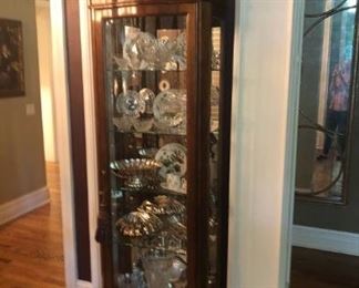Beautiful curio cabinet  77 inches tall x 13.75 deep 28 inches wide at the crown and 25.5 inches wide at base$375.00