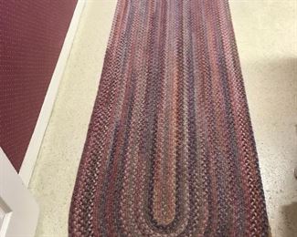 Many braided rugs 