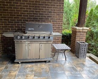 Large Ducane Stainless Steel natural gas grill with side burner and rotisserie setting