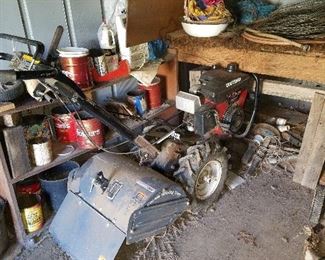 Craftsman 6.0 rototiller. This will get the job done.
