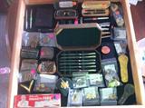 Sterling Silver Knives, Old Foreign Coins, Some silver coins, transit tokens, pocket knives, Vintage Fountain Pens, belt buckles and more.