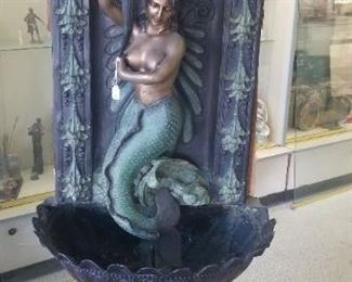 Bronze mermaid fountain