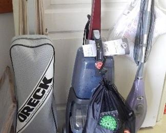 Oreck vacuum, Hoover carpet cleaner, Shark steam mop