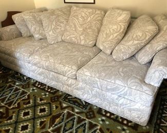 3 Cushion Upholstered Sofa with Pillow Back. Neutral Fabric 