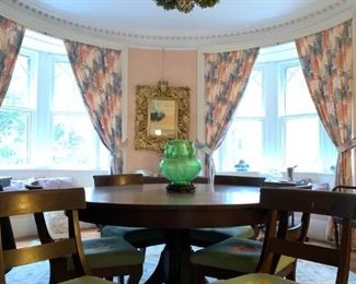 Round Pedestal Table with Six Rounded Back Side Chairs