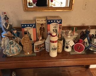 Collection of mostly full/unsealed decanters