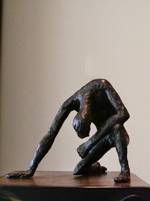 "Man Kneeling" by Victor Salmones (1937-89) signed lower left leg.