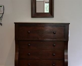 American Classical Period Large Chest of Drawers, American Classical Period Mirror with Ogee Frame.